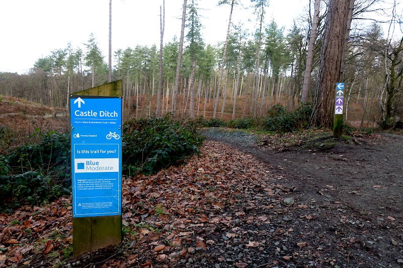 Blue sign leading to the Castle Ditch segment